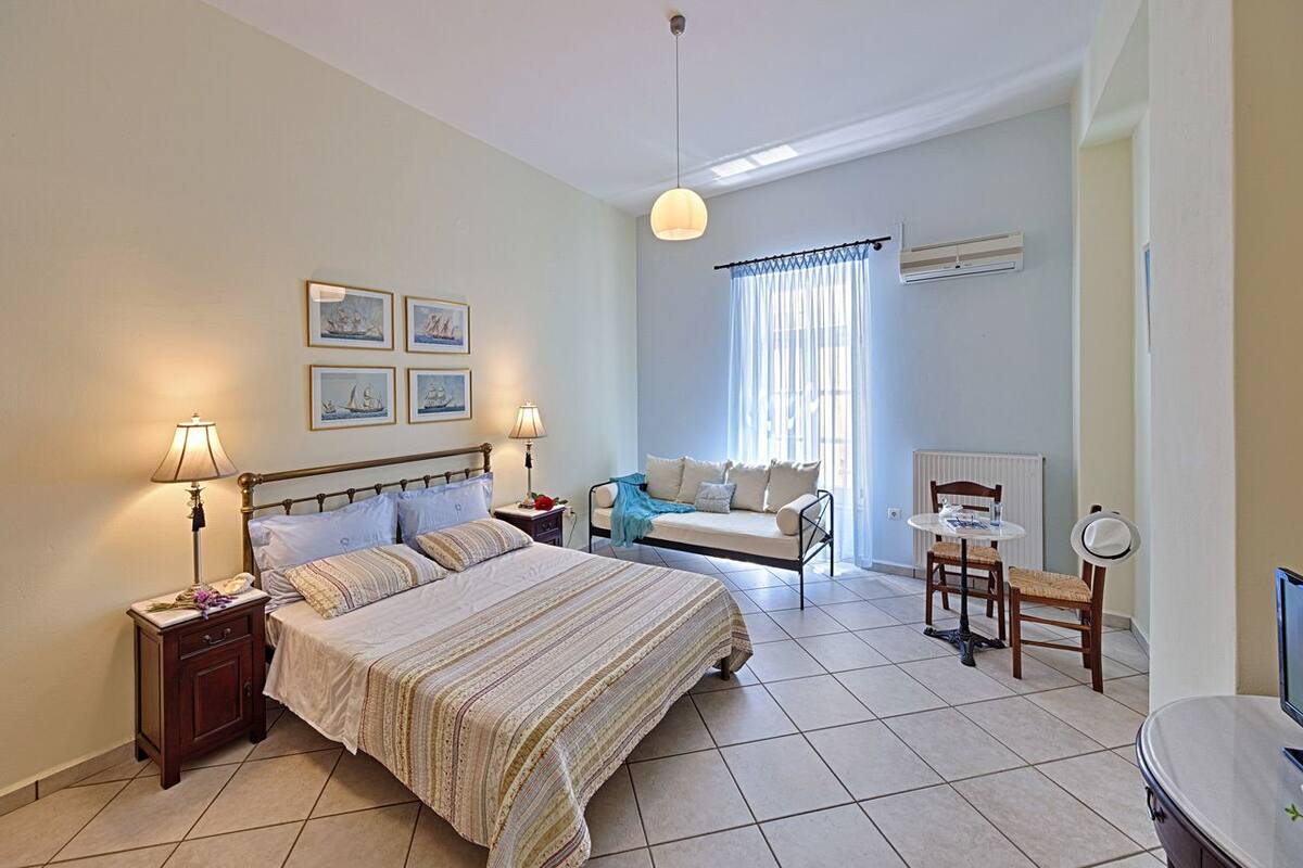 Superior Studio | Living area | Flat-screen TV