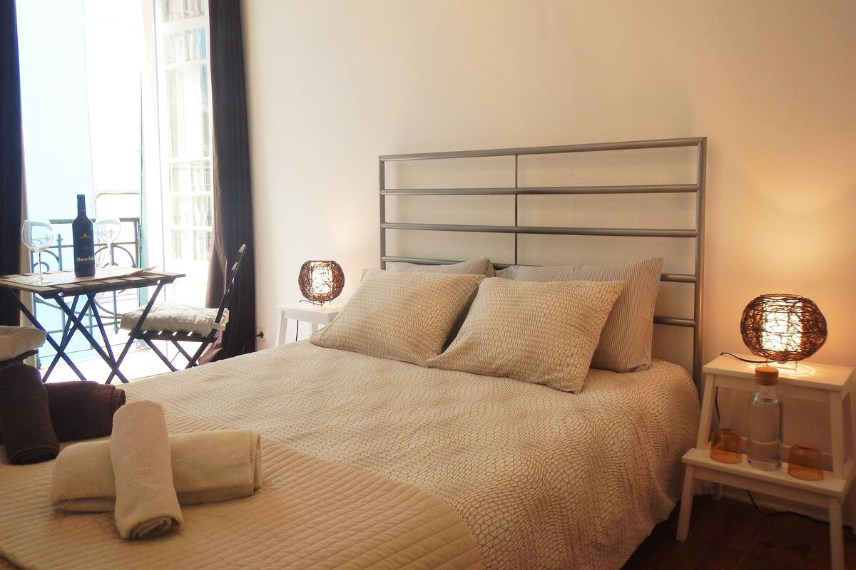 Double Room, Shared Bathroom (Earth Room) | Blackout drapes, iron/ironing board, free WiFi, bed sheets