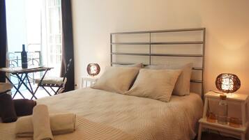 Double Room, Shared Bathroom (Earth Room) | Blackout curtains, iron/ironing board, free WiFi, bed sheets