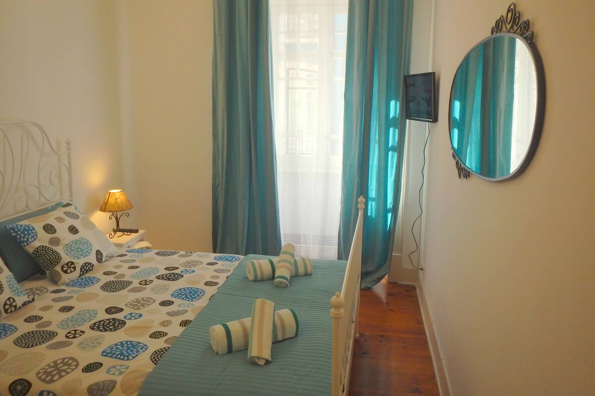 Double Room, Shared Bathroom (Aqua Room) | Blackout drapes, iron/ironing board, free WiFi, bed sheets