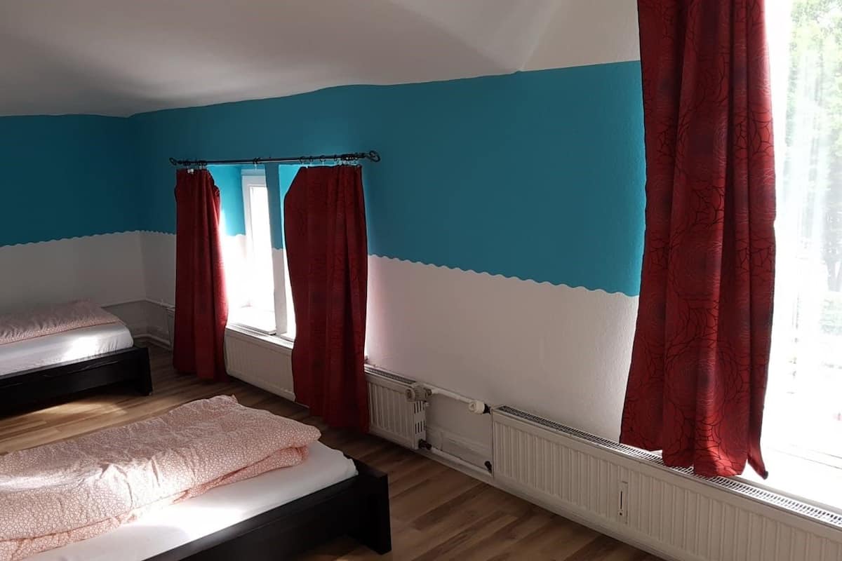 Desk, soundproofing, iron/ironing board, free cribs/infant beds