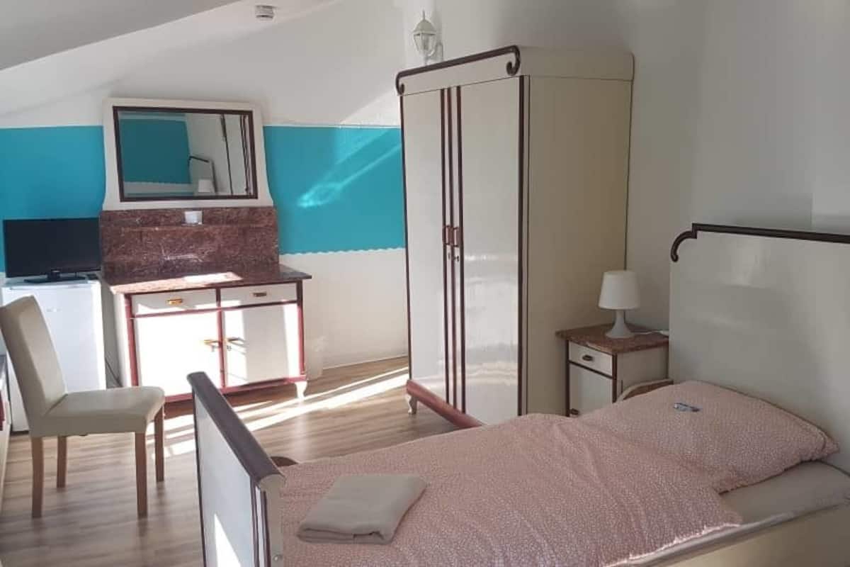 Desk, soundproofing, iron/ironing board, free cribs/infant beds