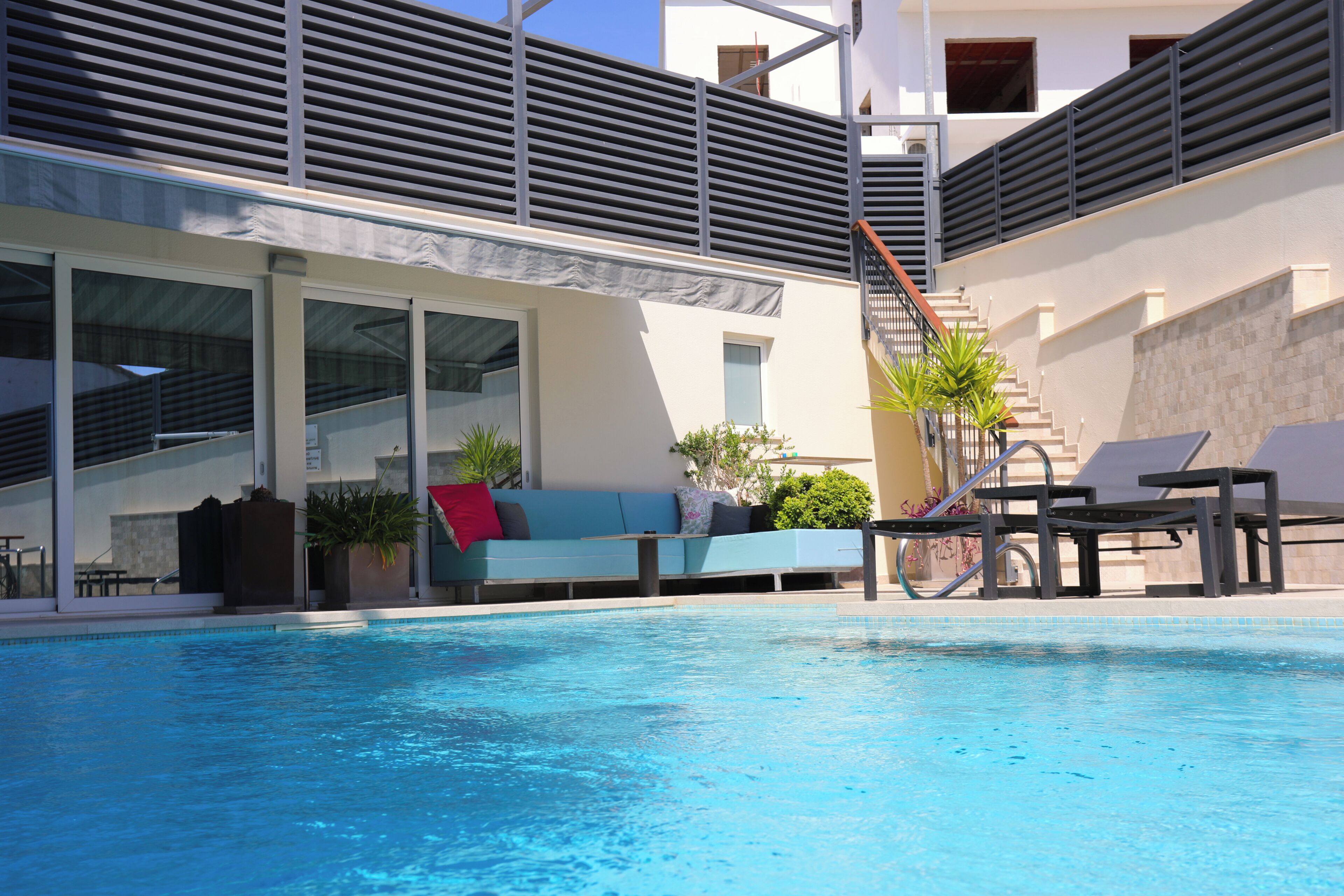 2 outdoor pools, open 9 am to 9 pm, pool loungers