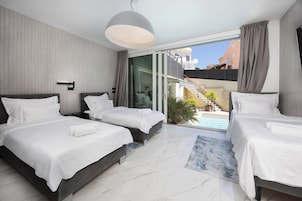 Premium bedding, down comforters, Tempur-Pedic beds, in-room safe