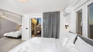 Superior Quadruple Room | Premium bedding, Tempur-Pedic beds, in-room safe, blackout drapes
