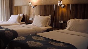 Family Room | Egyptian cotton sheets, premium bedding, down comforters