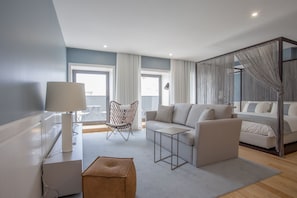 Luxury Studio, Balcony | Living area | Flat-screen TV