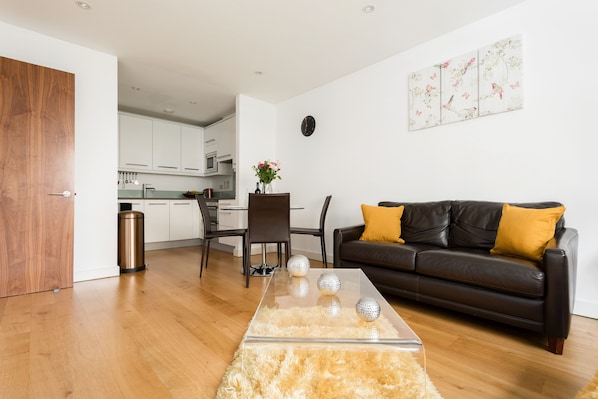 Apartment, 2 Bedrooms, 2 Bathrooms, City View | Living room | Flat-screen TV, Netflix, DVD player