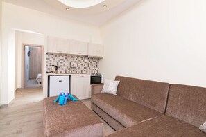 Deluxe Apartment, Non Smoking | Living area | Flat-screen TV - Lena Apartments (Thasos)