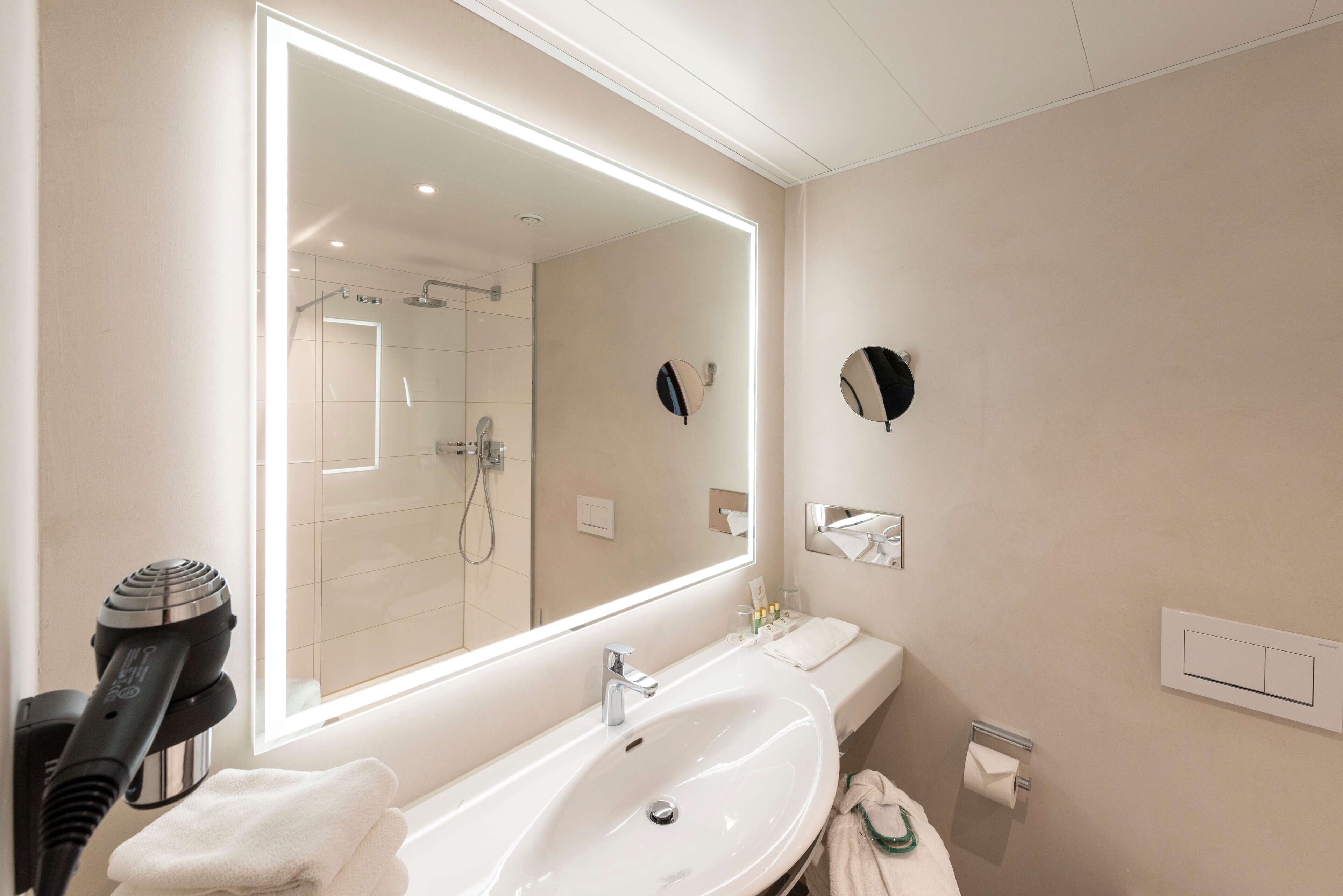 Bathroom | Deep soaking tub, free toiletries, hair dryer, slippers