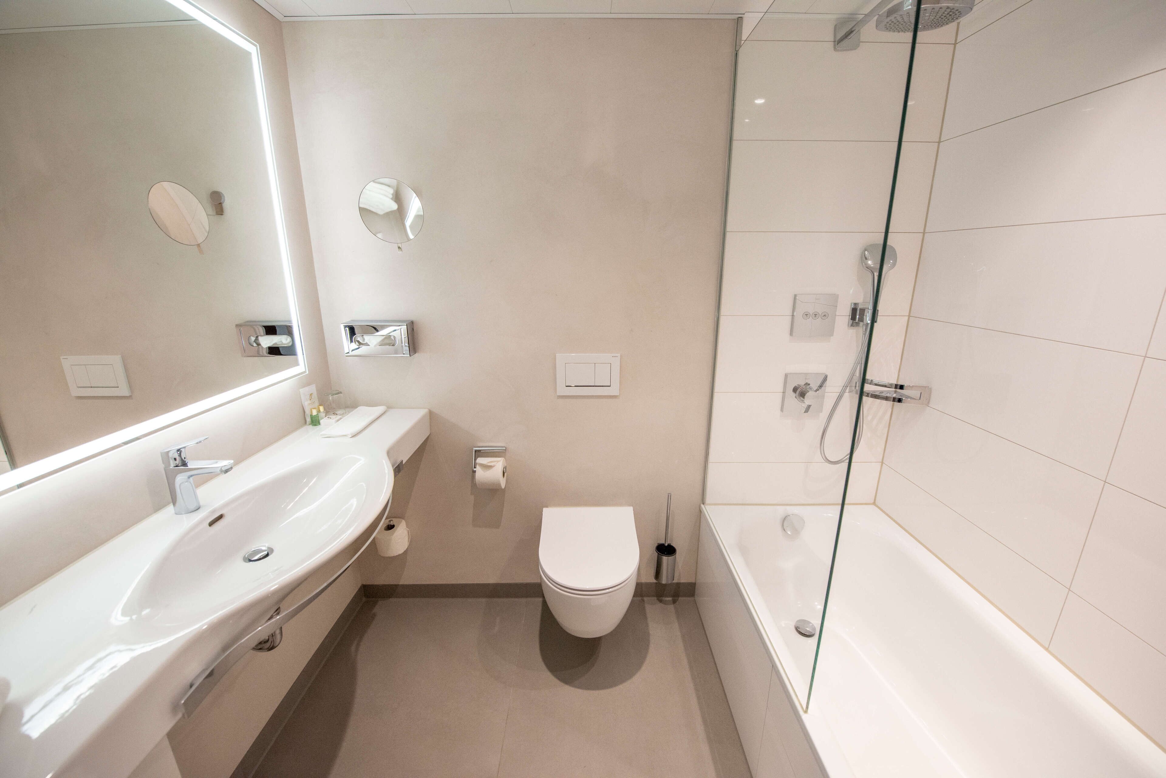 deep-soaking bathtub, free toiletries, hair dryer, slippers