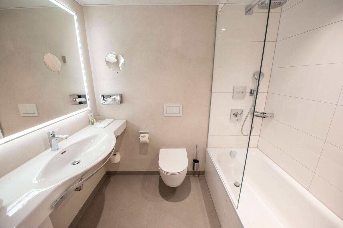 deep-soaking bathtub, free toiletries, hair dryer, slippers