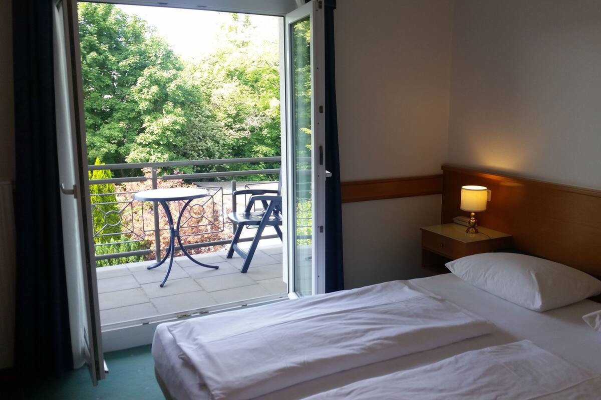 desk, laptop workspace, blackout curtains, free wifi