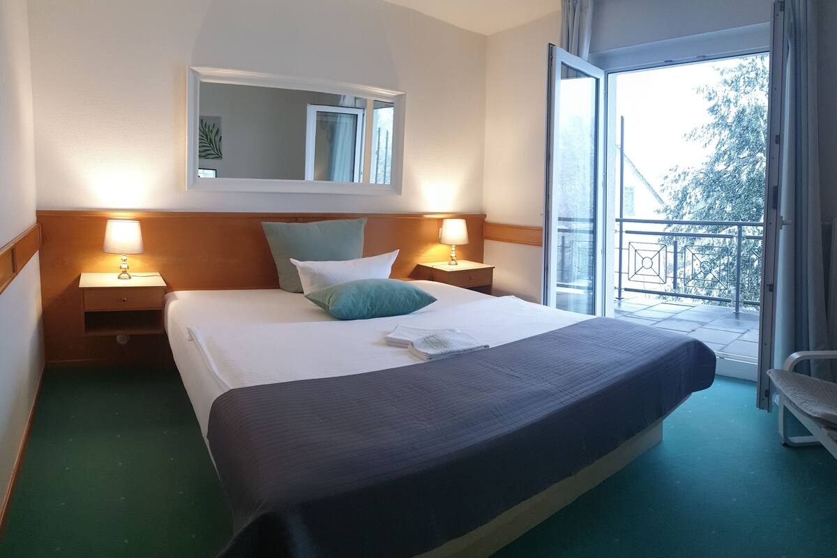 double room, balcony | desk, laptop workspace, blackout curtains, free wifi