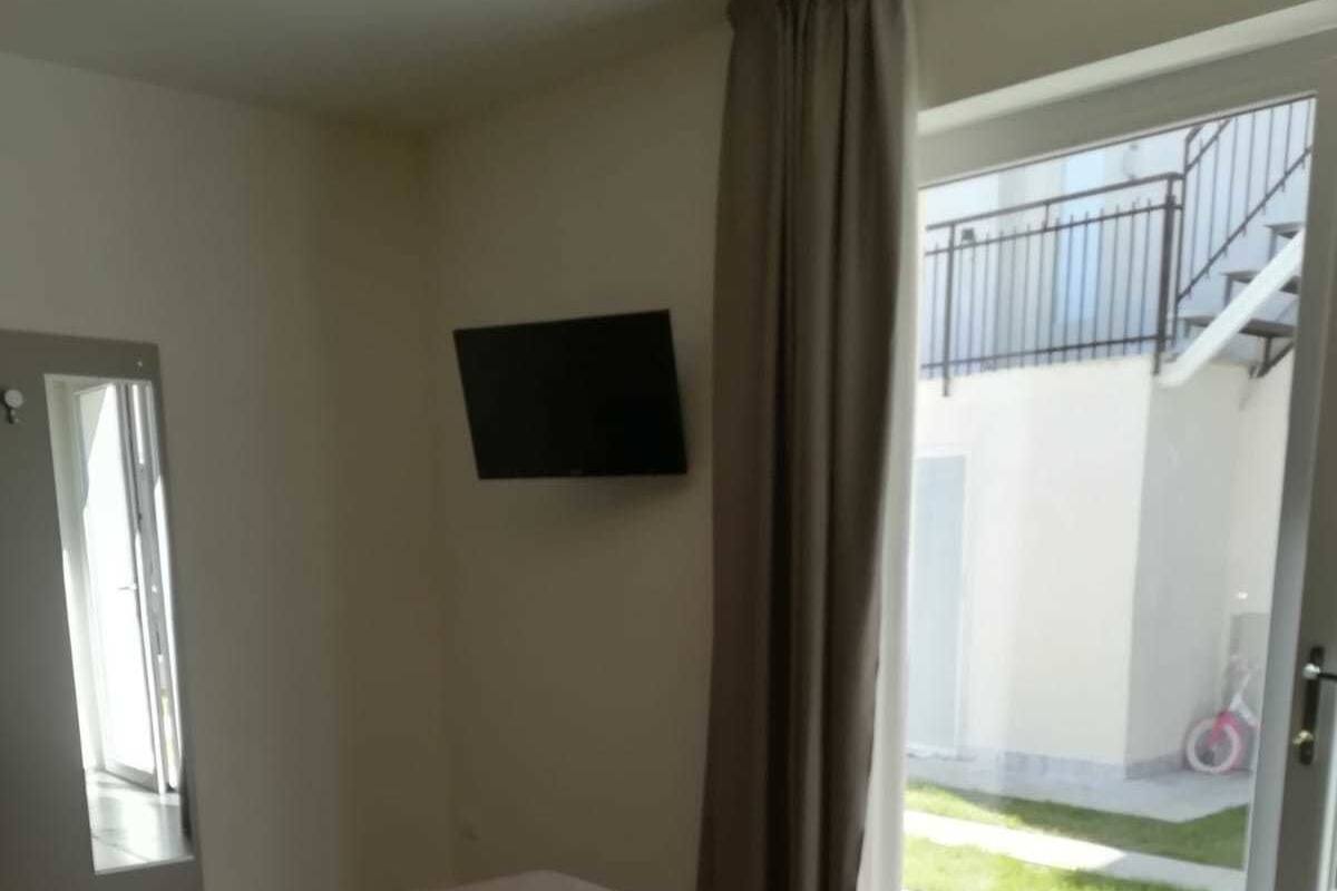 Habitación cuádruple | Escritorio, camas extra, wifi gratis y ropa de cama