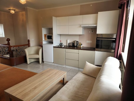 Family Suite | Living area | Plasma TV