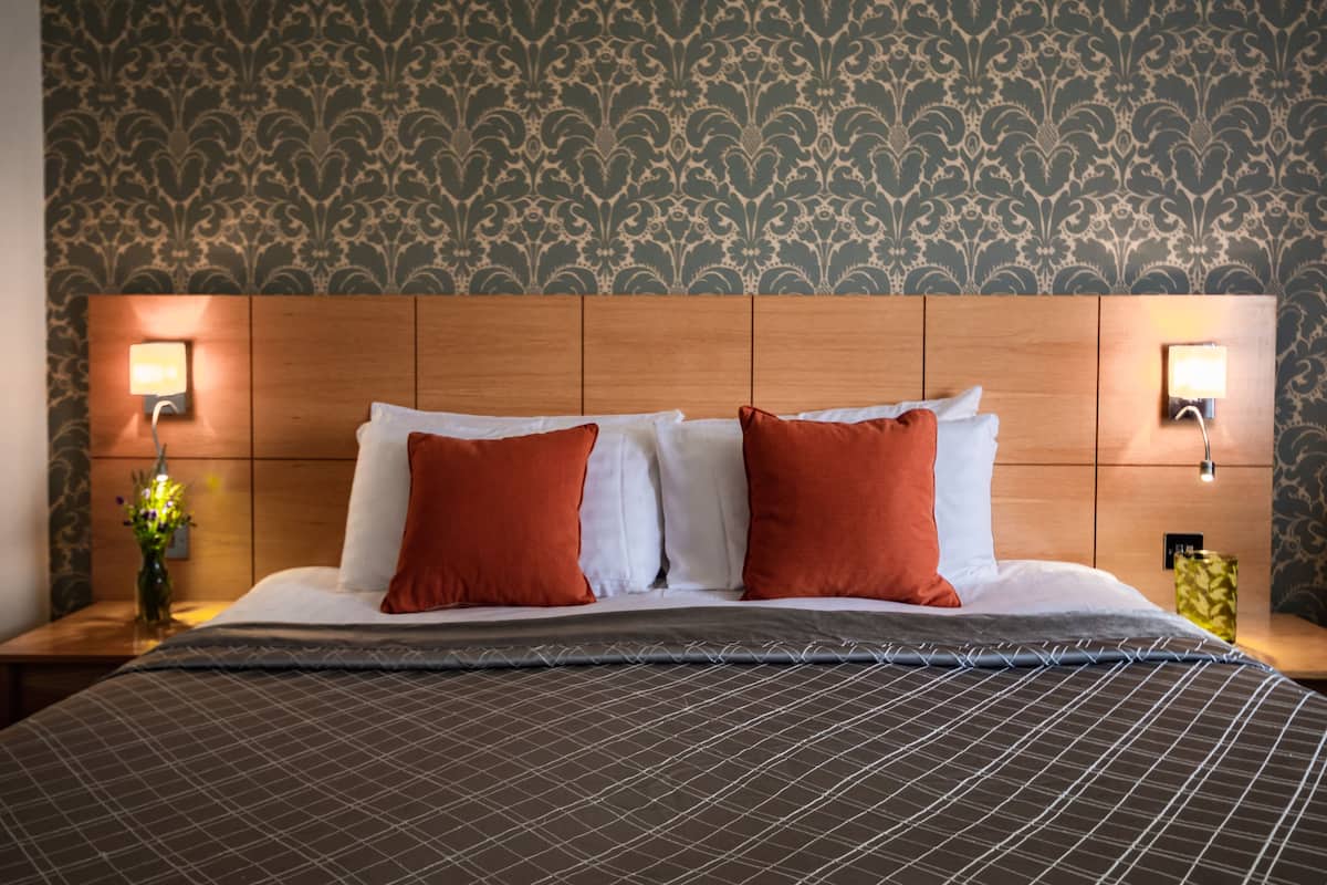 in-room safe, desk, blackout curtains, iron/ironing board