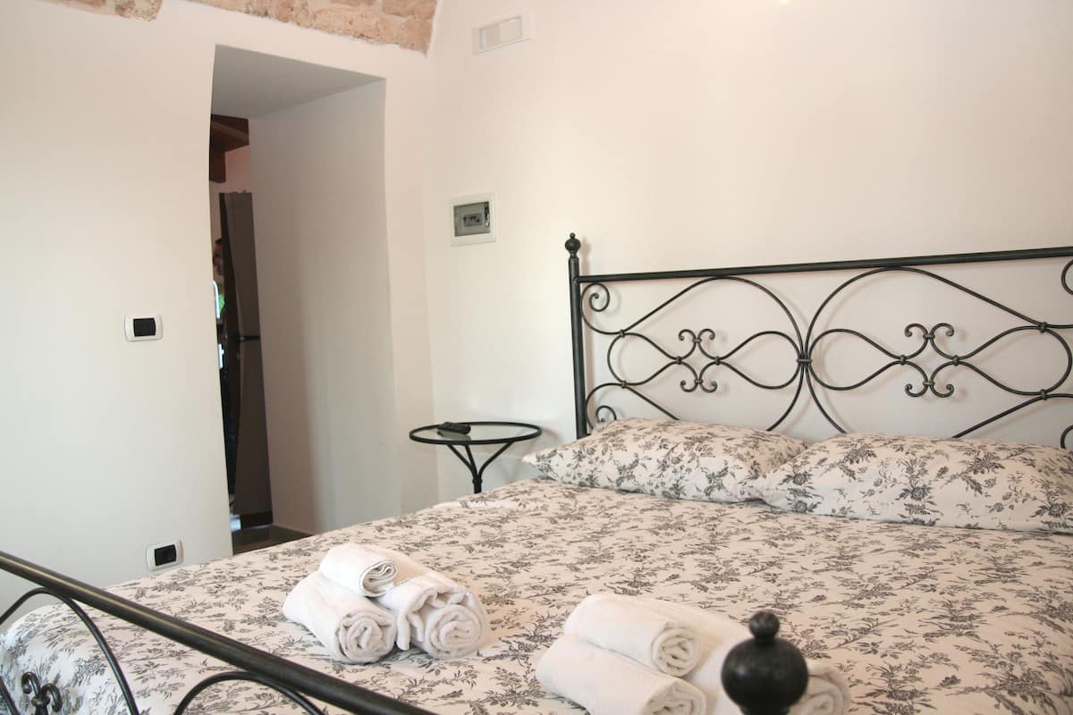 Chambre Quadruple Standard (Ulivo) | Minibar, lits bébé (en supplément), Wi-Fi gratuit, draps fournis