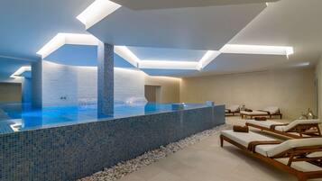 Indoor pool, 3 outdoor pools, open 10:00 AM to 7:00 PM, pool umbrellas