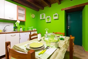 Apartamento, 1 habitación | Cocina privada | Frigorífico, horno, placa de cocina y máquina de café espresso
