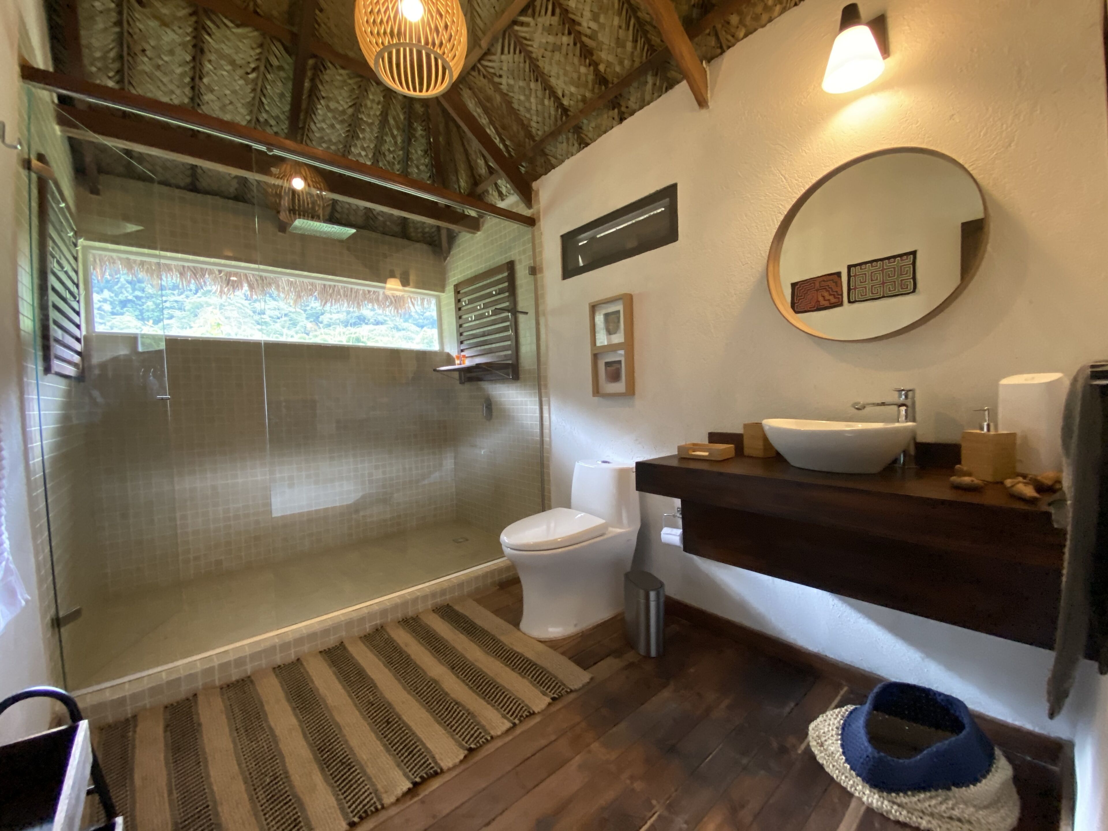 waterfall view's king deluxe | bathroom | shower, rainfall showerhead, designer toiletries, towels