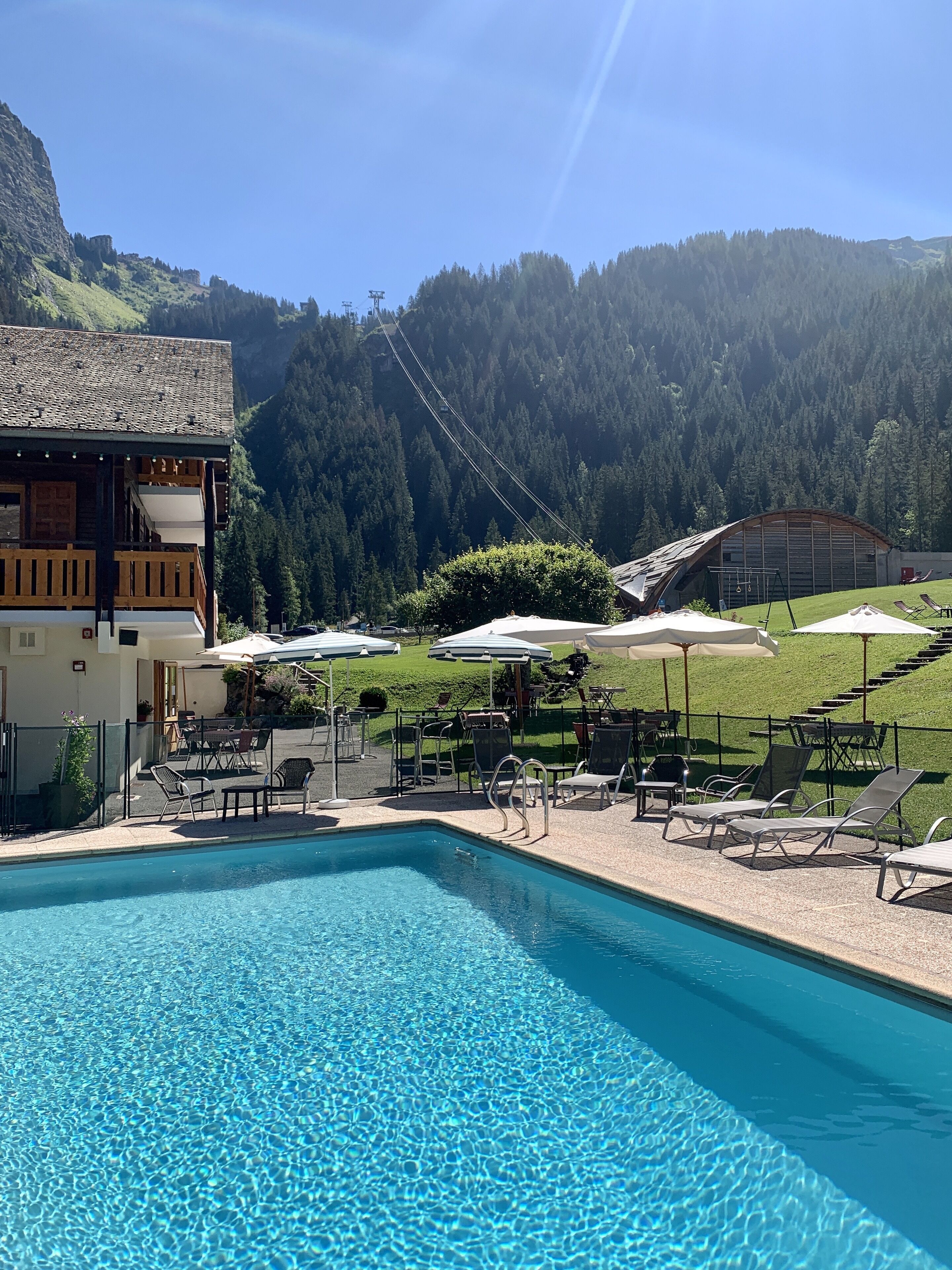 Seasonal outdoor pool, pool umbrellas, sun loungers