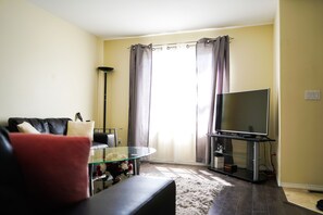 Economy Single Room, 1 Bedroom | Living area | TV - Lakewood's Local Living Quarters (Saskatoon)