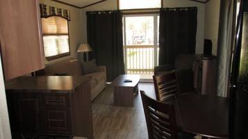 Cottage, 2 Bedrooms (No Linens Included) | Living area | Flat-screen TV, fireplace, DVD player