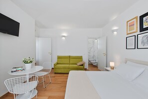 Quadruple Room, Terrace, City View | Minibar, desk, soundproofing, cribs/infant beds - LuxAttico b&b (Lecce)