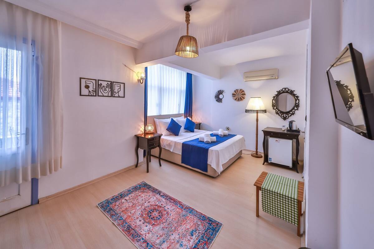 Deluxe Tek Büyük Yataklı Oda, 1 Büyük (Queen) Boy Yatak, Sigara İçilmez | Minibar, ücretsiz kablosuz İnternet, çarşaf takımı