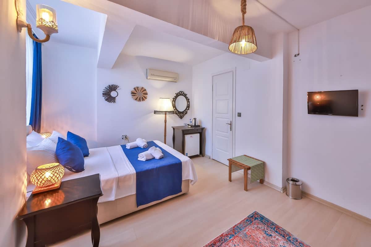 Deluxe Tek Büyük Yataklı Oda, 1 Büyük (Queen) Boy Yatak, Sigara İçilmez | Minibar, ücretsiz kablosuz İnternet, çarşaf takımı