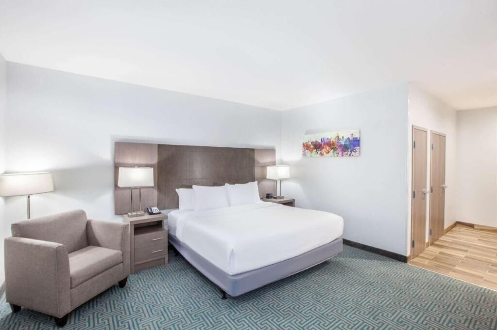 Premium bedding, desk, laptop workspace, soundproofing