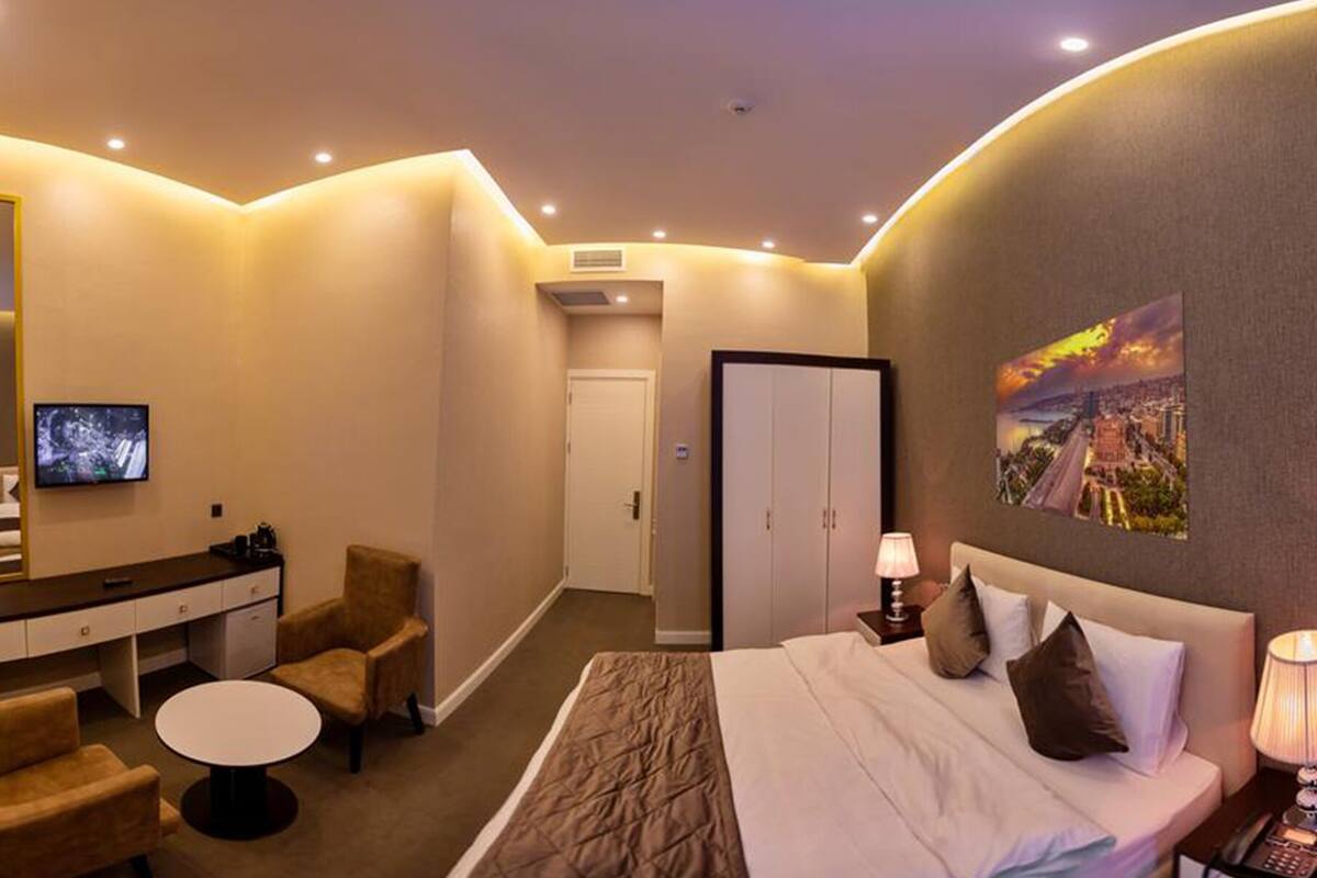 Premium bedding, down comforters, minibar, in-room safe