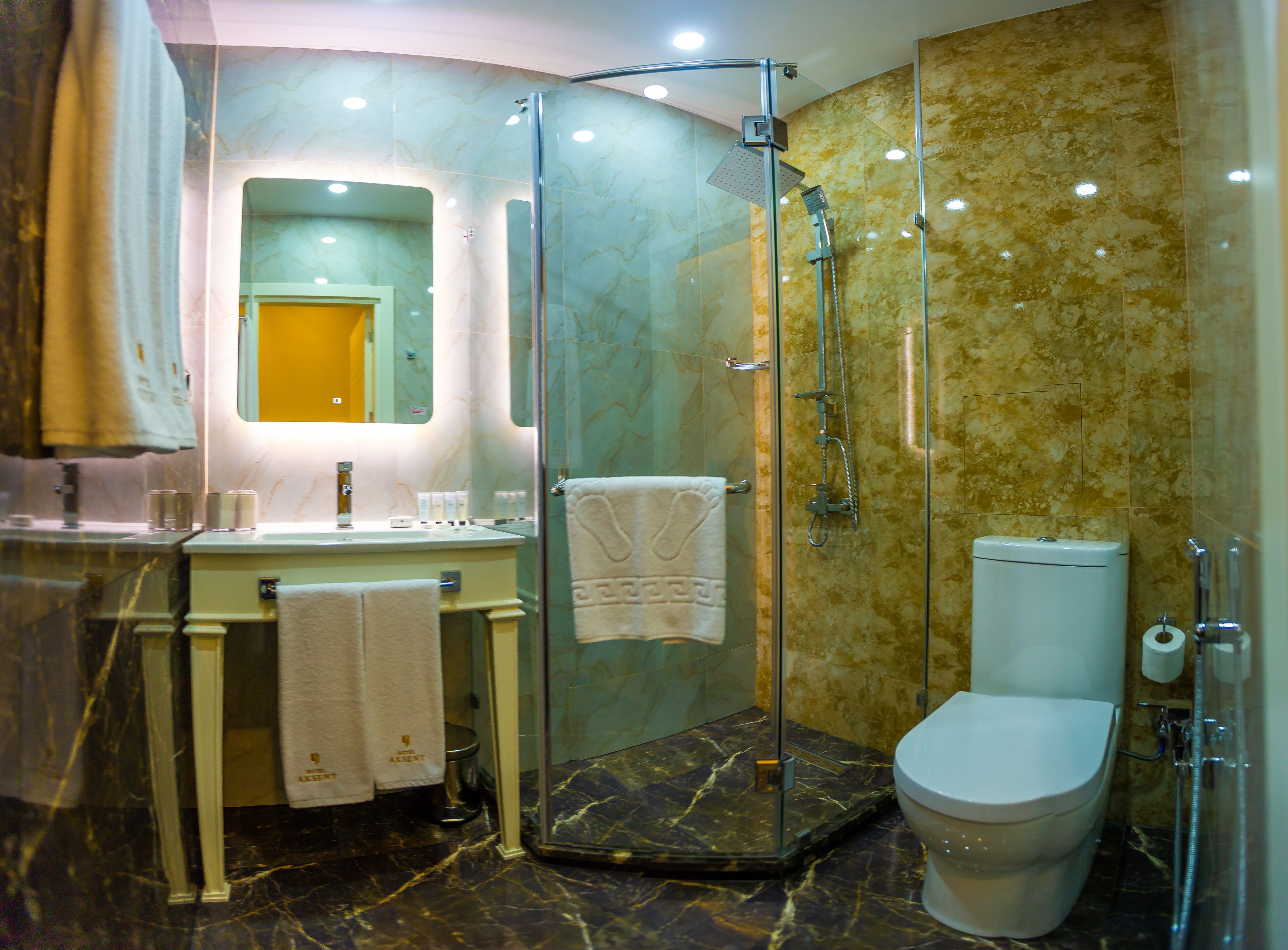 standard double room, 1 king bed | bathroom | shower, rainfall showerhead, free toiletries, hair dryer