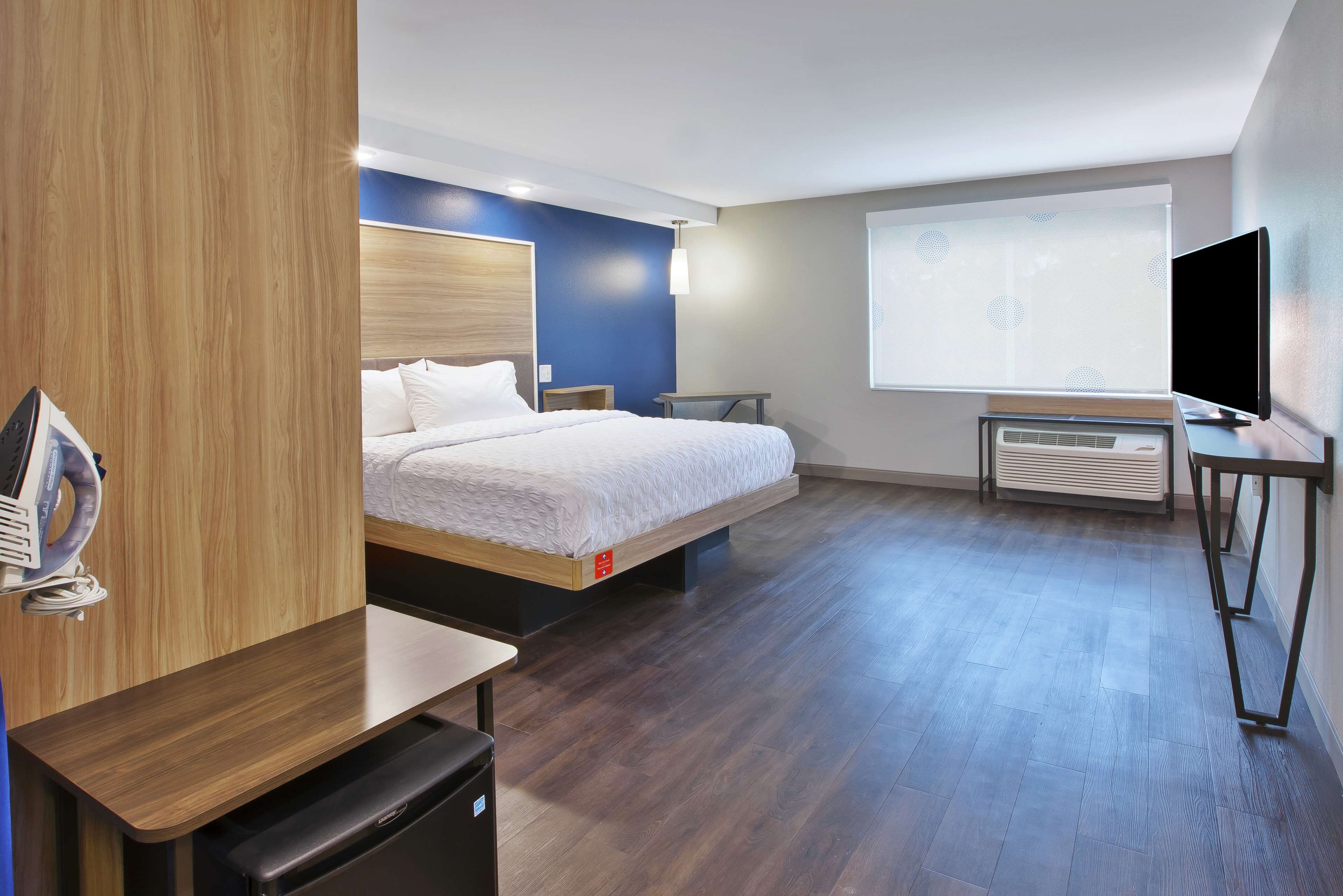 desk, laptop workspace, iron/ironing board, free cots/infant beds