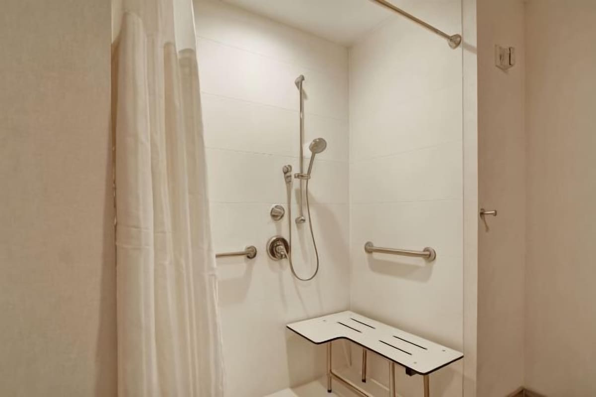Bathroom | Rainfall showerhead, free toiletries, hair dryer, bathrobes
