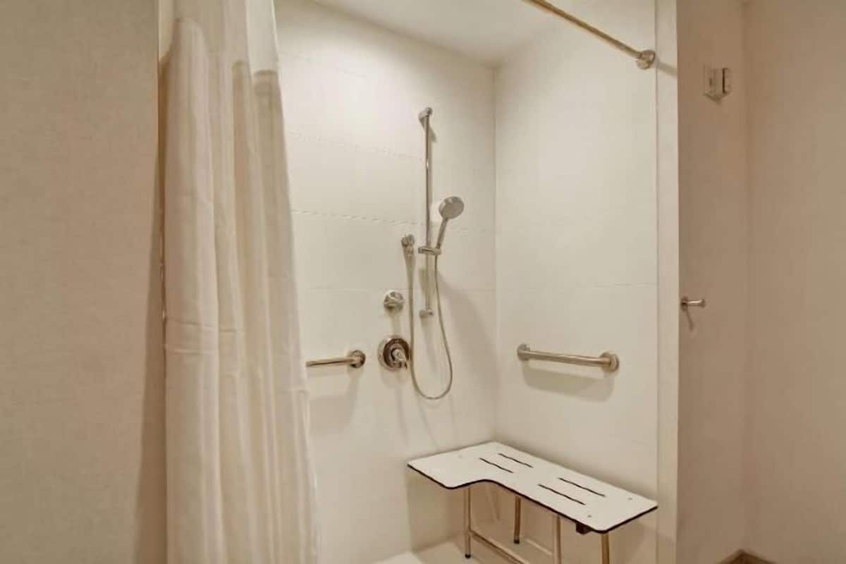 Bathroom | Rainfall showerhead, free toiletries, hair dryer, bathrobes