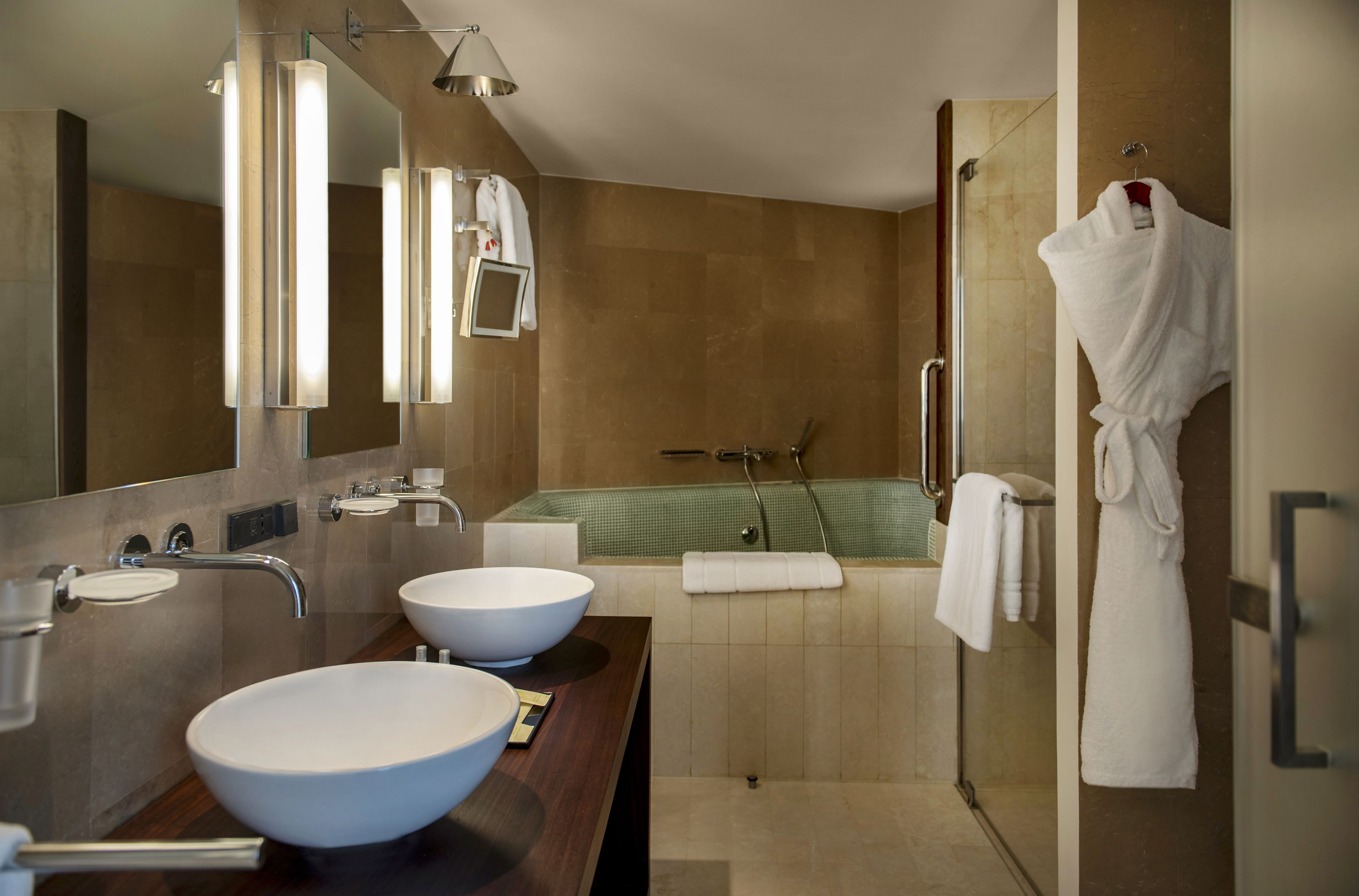 rainfall showerhead, designer toiletries, hair dryer, bathrobes