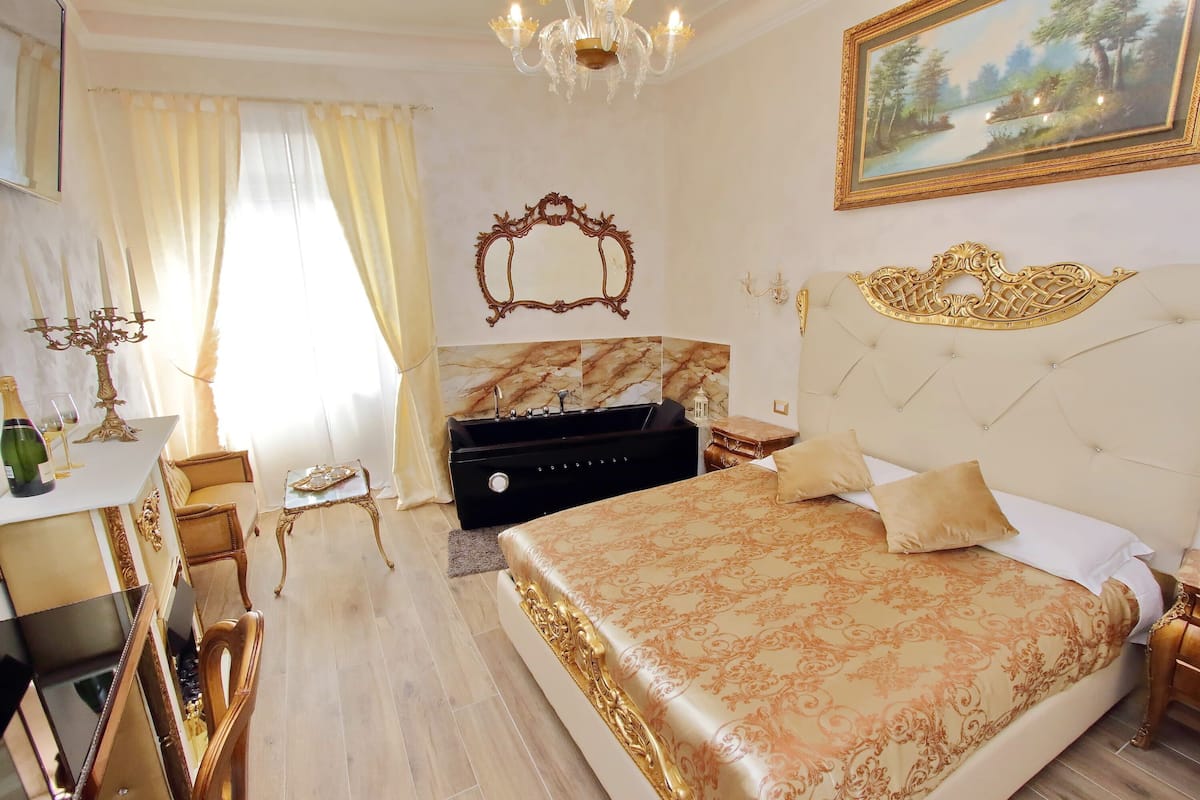 Superior Suite, 1 Queen Bed, Non Smoking | 1 bedroom, minibar, in-room safe, individually decorated