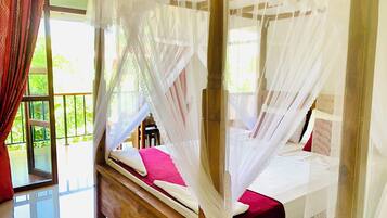 Deluxe Triple Room with Balcony | Garden view