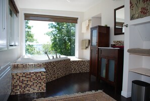 Jetted bath, hair dryer, towels, soap