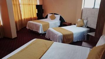 Premium bedding, down duvets, laptop workspace, blackout curtains