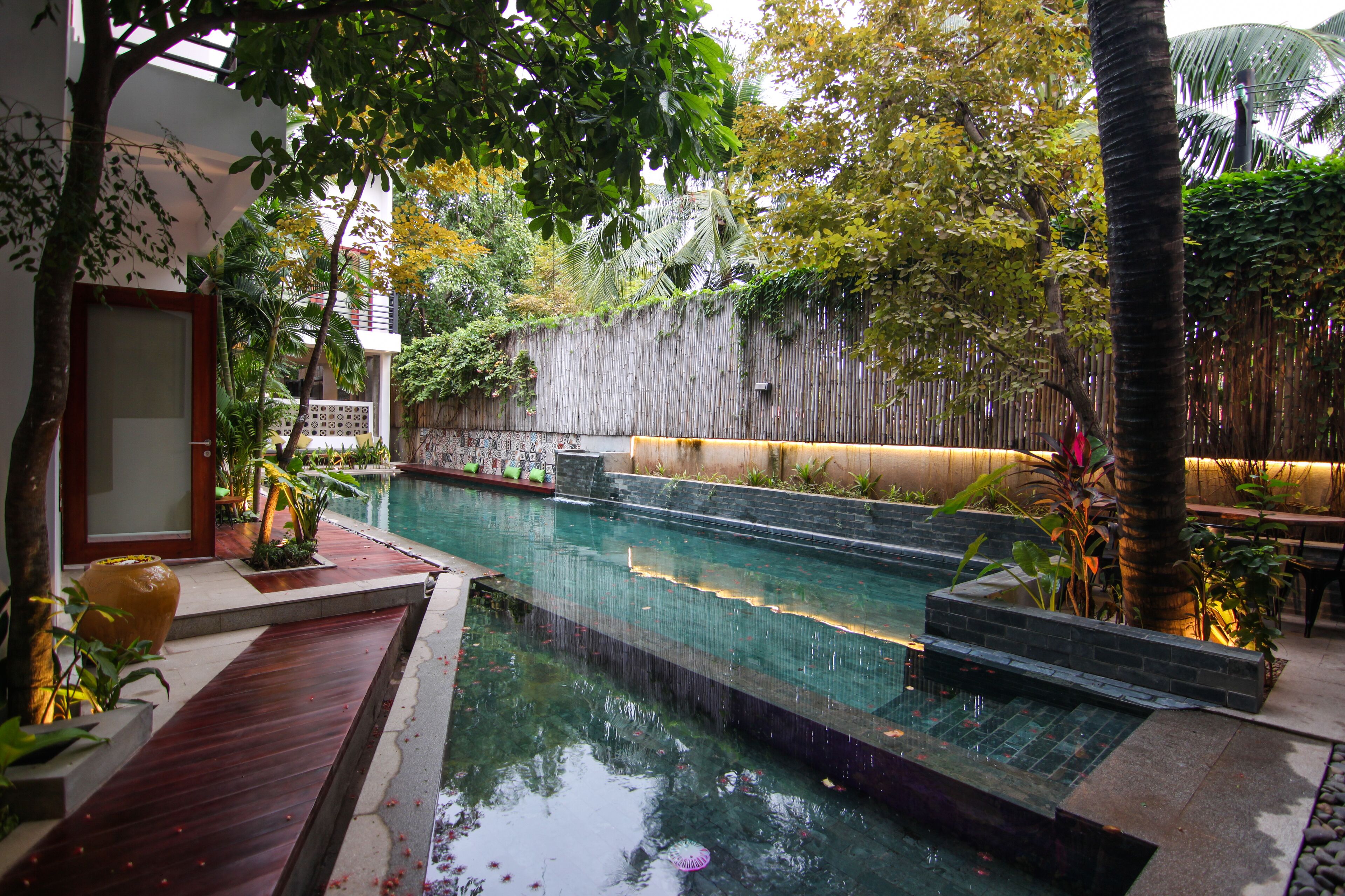 outdoor pool, pool umbrellas, pool loungers