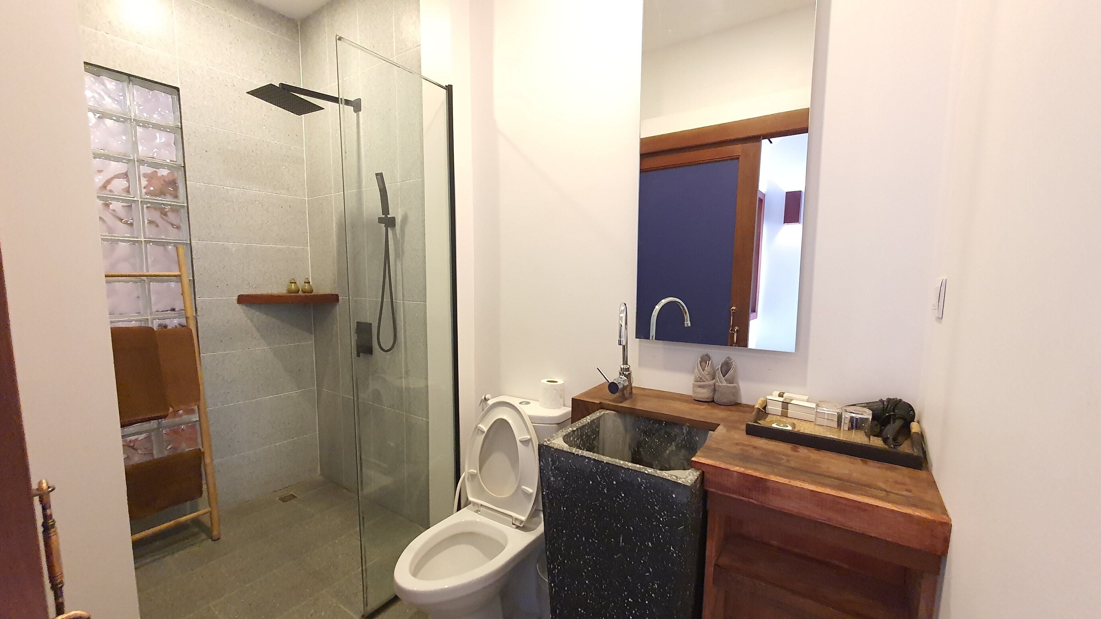 deluxe suite (free one way drop off) | bathroom | shower, free toiletries, hair dryer, bathrobes