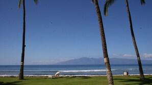 On the beach, sun loungers, beach towels