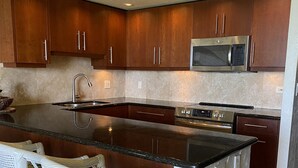 Coffee/tea maker, fridge, microwave, oven