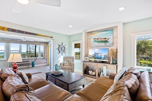 Spacious living room area - Beachfront Home Sleeps 12 with Private Balcony and Grill (New Smyrna Beach)