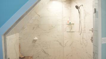 Combined shower/tub, hair dryer, towels, soap