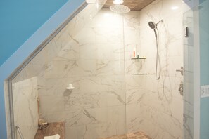 Combined shower/tub, hair dryer, towels, soap