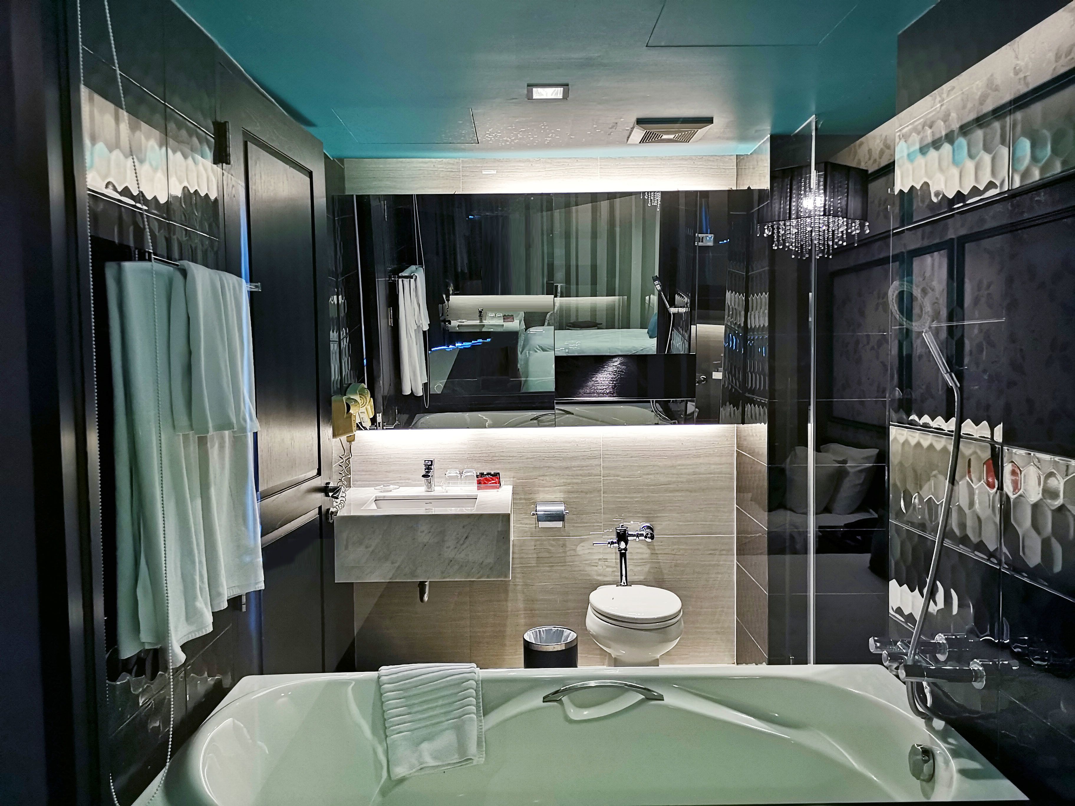 separate bathtub and shower, deep-soaking bathtub, rainfall showerhead